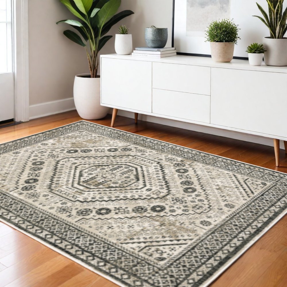 4' X 6' Ivory Grey Black And Ivory Oriental Power Loom Stain Resistant Area Rug