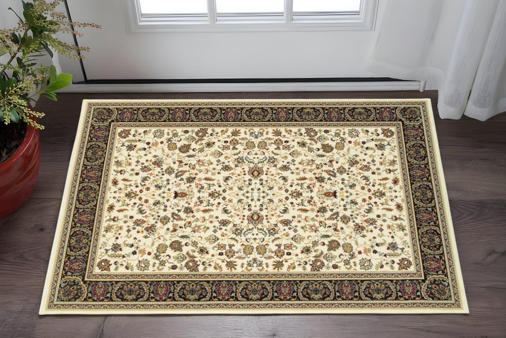 2' X 4' Ivory And Black Oriental Power Loom Stain Resistant Area Rug