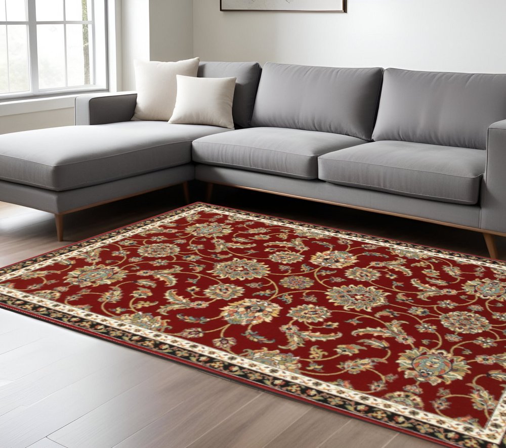 6' X 9' Red Black Blue Ivory Green And Salmon Oriental Power Loom Stain Resistant Area Rug