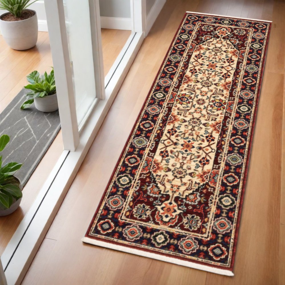 2' X 6' Red Ivory Blue And Orange Oriental Power Loom Stain Resistant Runner Rug With Fringe