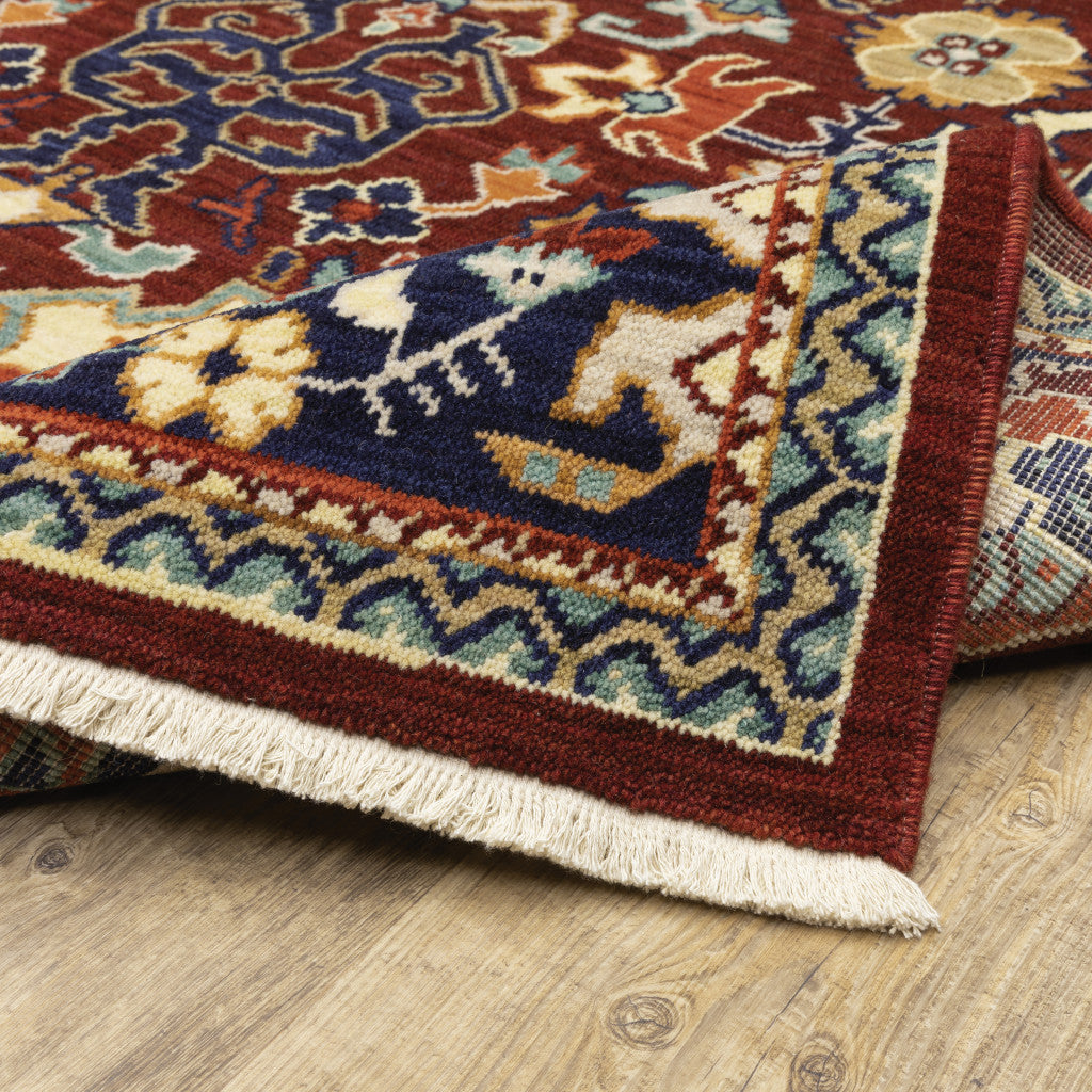 5' X 8' Red Blue Orange And Beige Oriental Power Loom Stain Resistant Area Rug With Fringe