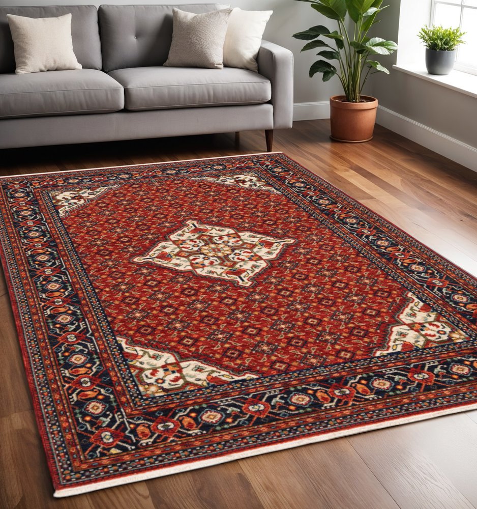 5' X 8' Red Blue And Black Oriental Area Rug With Fringe