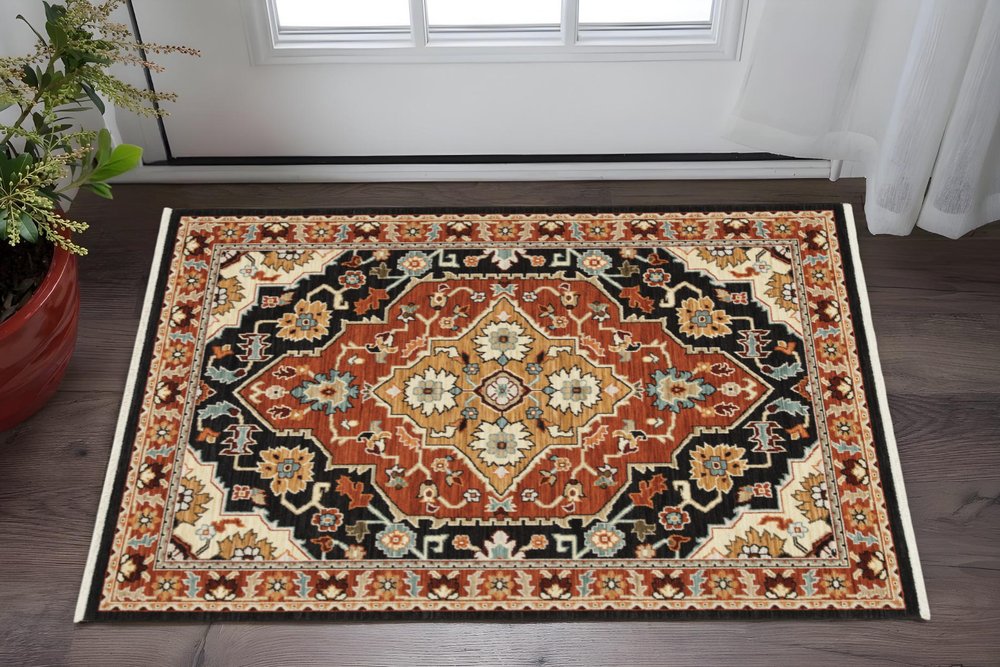 3' X 5' Black Orange And Beige Oriental Power Loom Stain Resistant Area Rug With Fringe