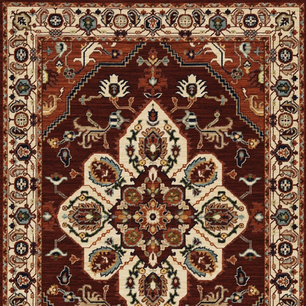 5' X 8' Red Ivory Orange And Blue Oriental Power Loom Stain Resistant Area Rug With Fringe