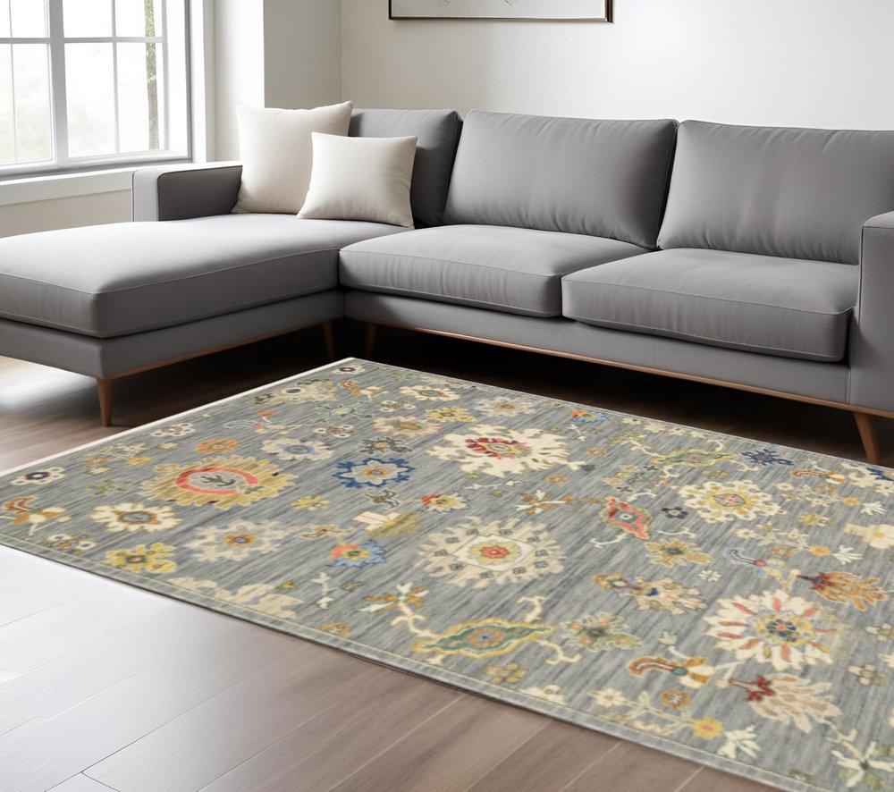 10' X 13' Grey Ivory Gold Salmon Red Blue And Green Oriental Power Loom Stain Resistant Area Rug With Fringe