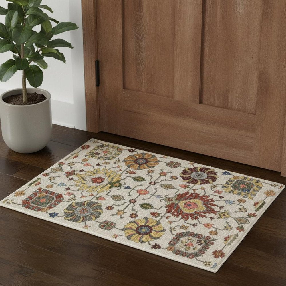 2' X 3' Ivory Yellow Rust Green Grey Pink Orange Blue And Grey Oriental Power Loom Stain Resistant Area Rug With Fringe