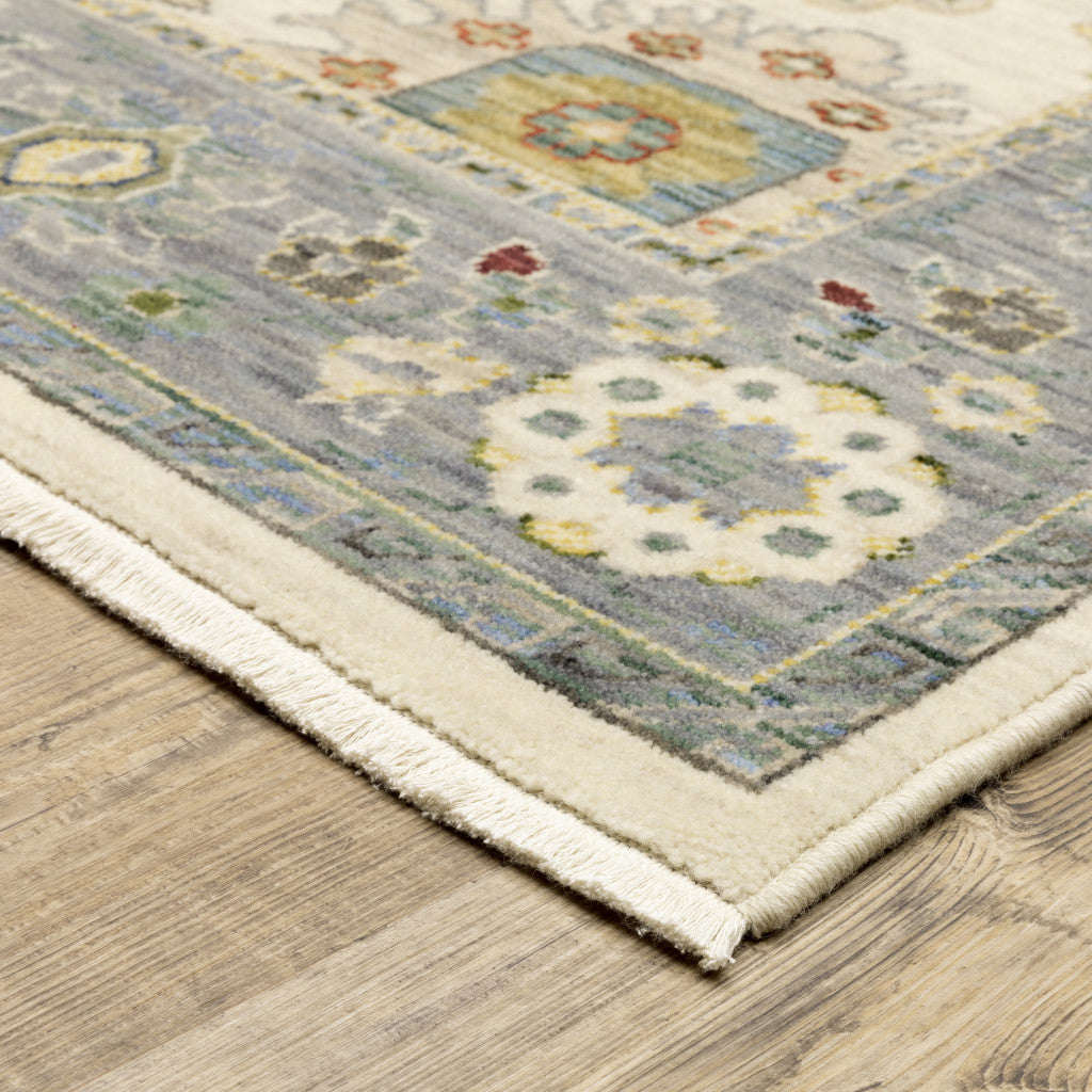 5' X 8' Ivory And Blue Oriental Area Rug With Fringe
