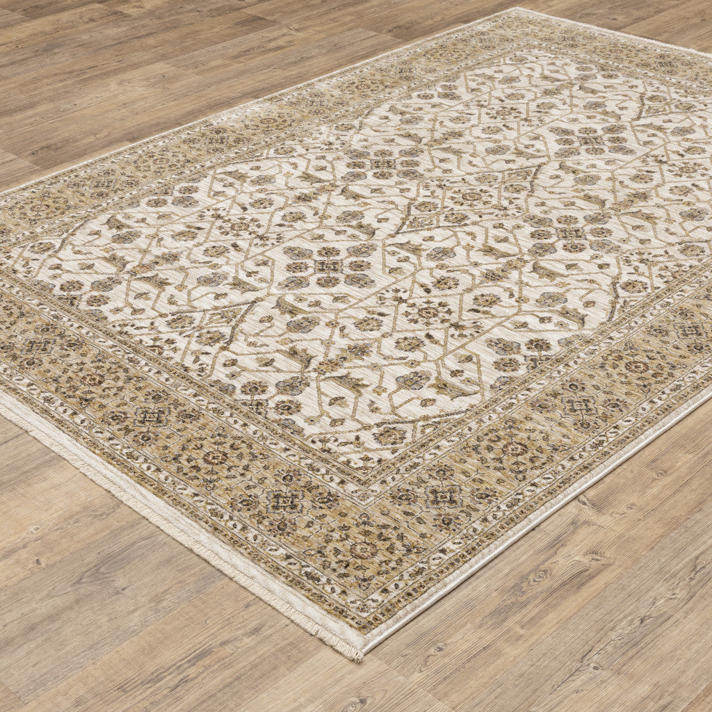 7' X 10' Ivory And Gold Oriental Area Rug With Fringe