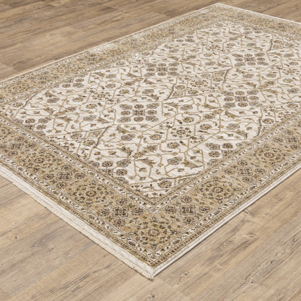 7' X 10' Ivory And Gold Oriental Area Rug With Fringe
