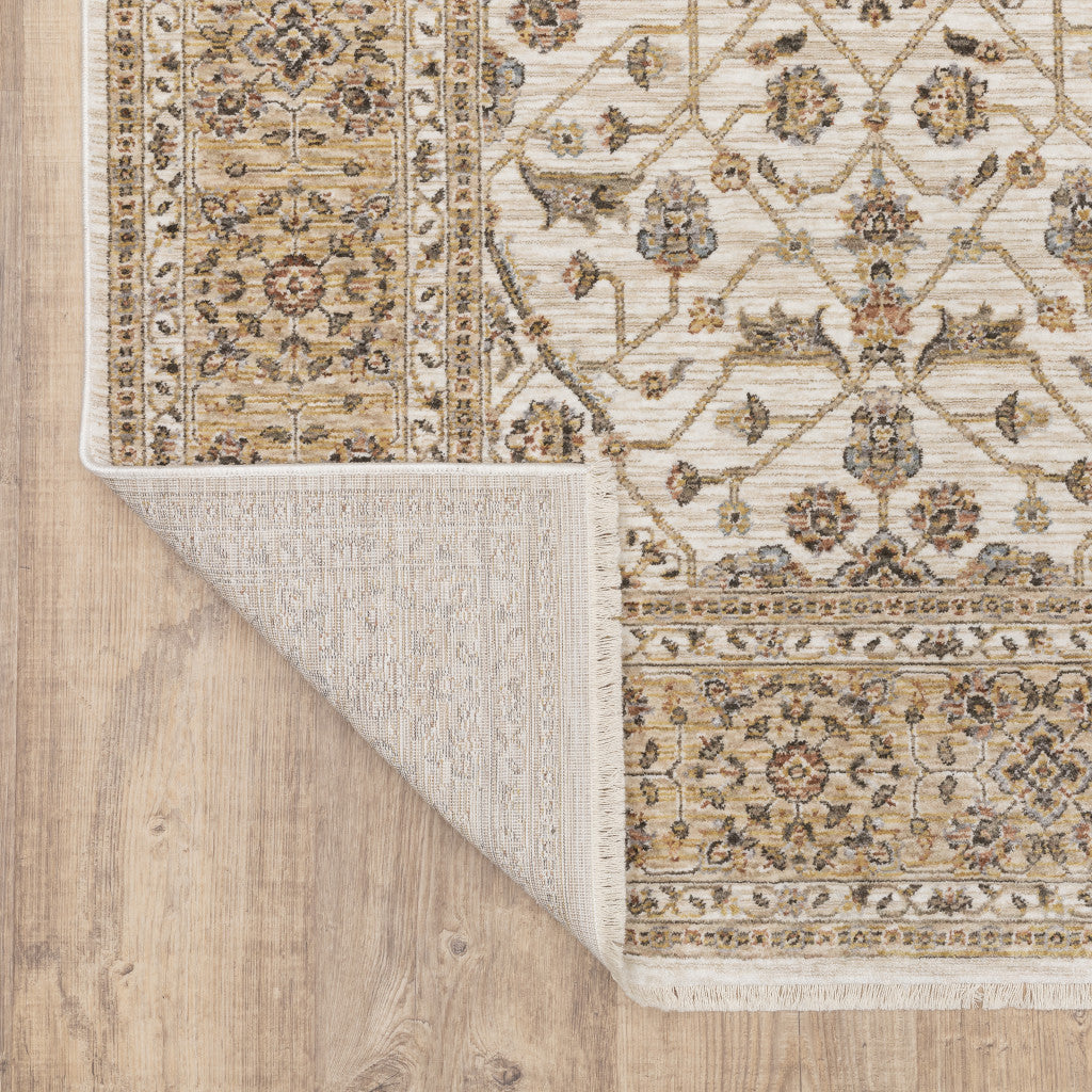 7' X 10' Ivory And Gold Oriental Area Rug With Fringe