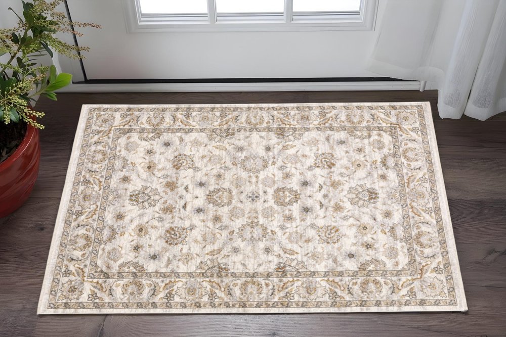 3' X 5' Ivory And Grey Oriental Power Loom Stain Resistant Area Rug With Fringe