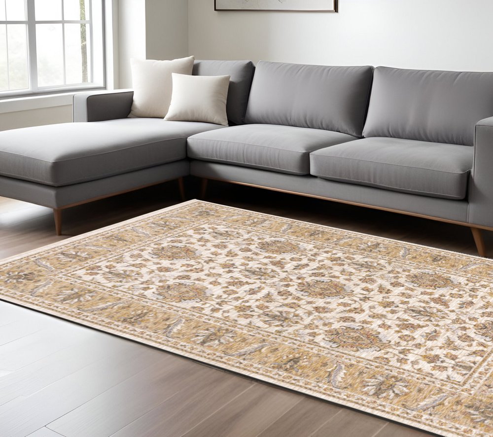 8' X 11' Ivory And Gold Oriental Area Rug With Fringe