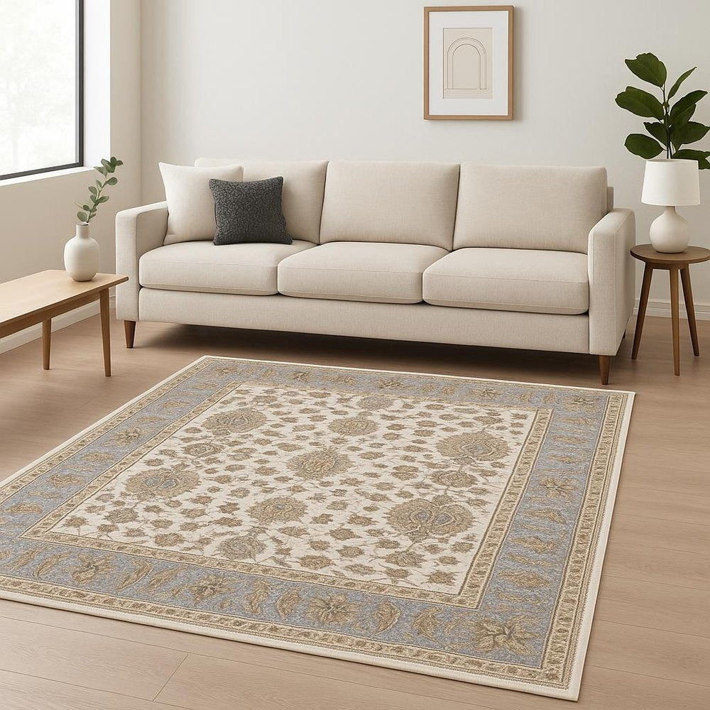6' X 9' Ivory And Blue Oriental Power Loom Stain Resistant Area Rug With Fringe