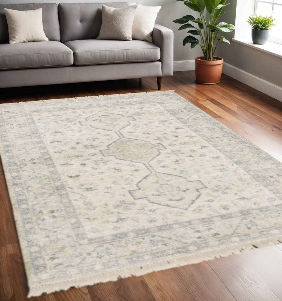 5' X 8' Beige And Charcoal Oriental Hand Loomed Stain Resistant Area Rug With Fringe