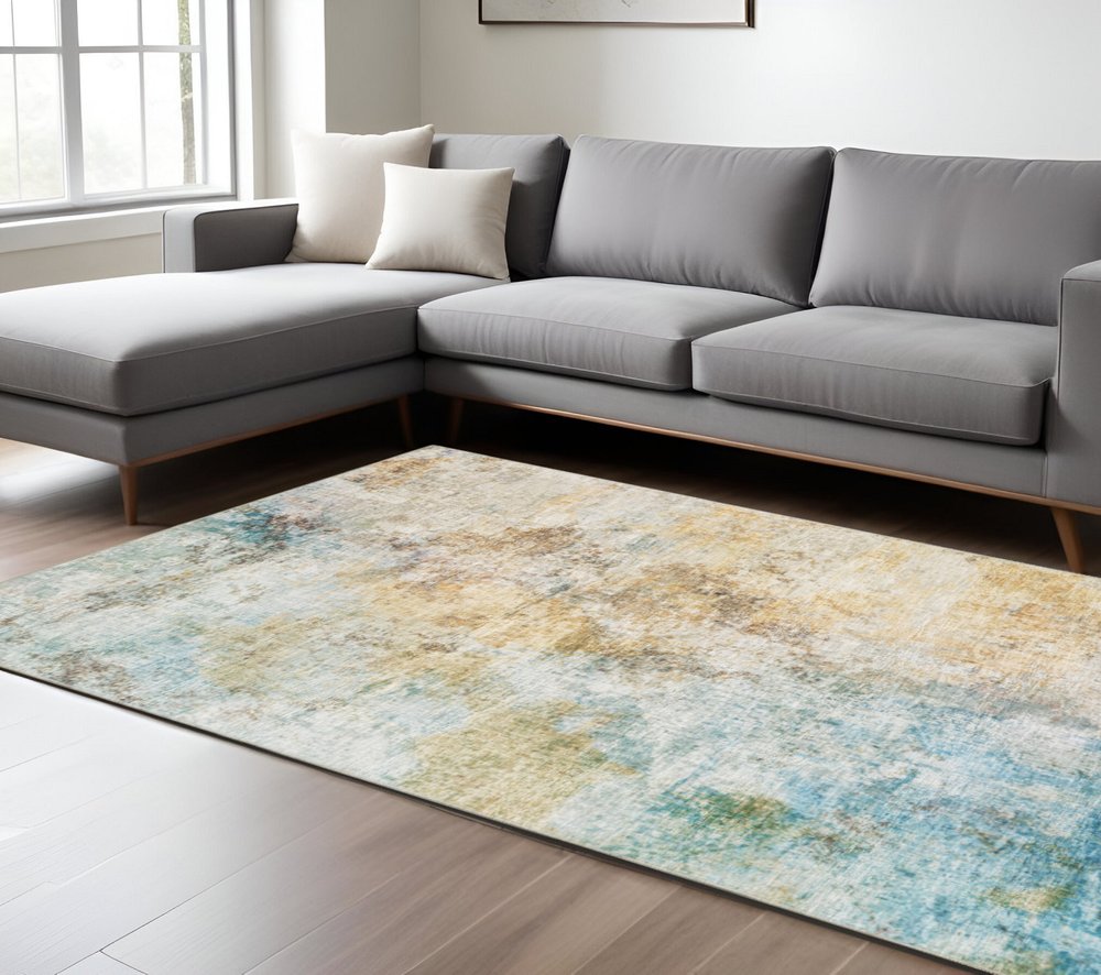 9' X 12' Yellow And Blue Abstract Area Rug