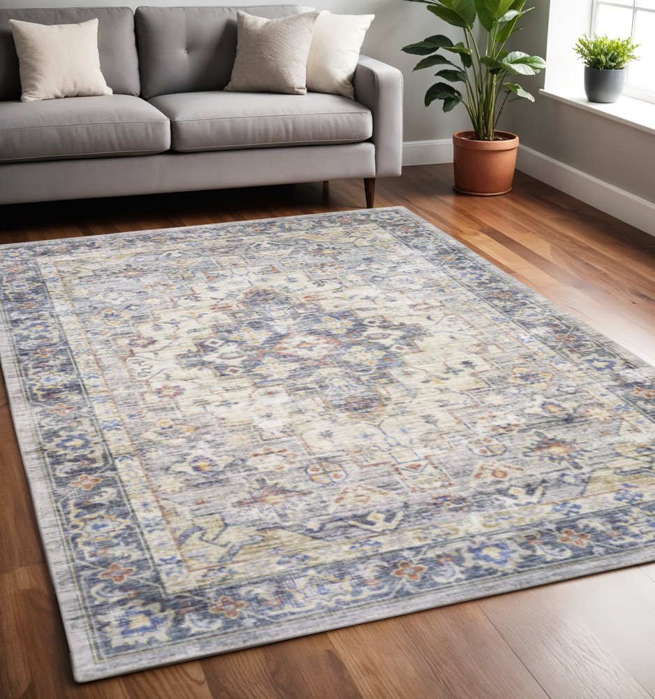 5' X 7' Blue Gold Grey Orange Yellow And Purple Oriental Power Loom Stain Resistant Area Rug