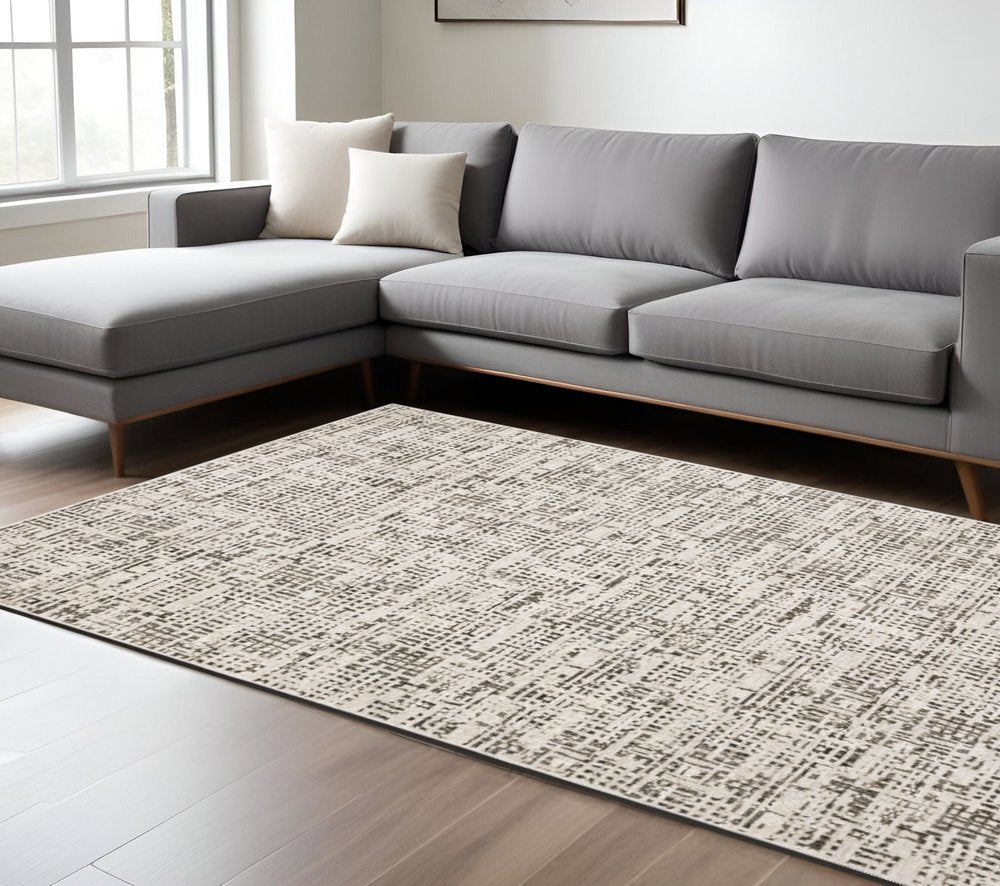 7' X 10' Ivory And Gray Abstract Area Rug