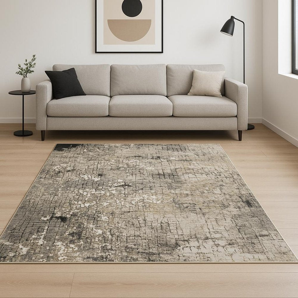 6' X 9' Grey Ivory Beige Charcoal Black Tan And Brown Abstract Power Loom Stain Resistant Area Rug