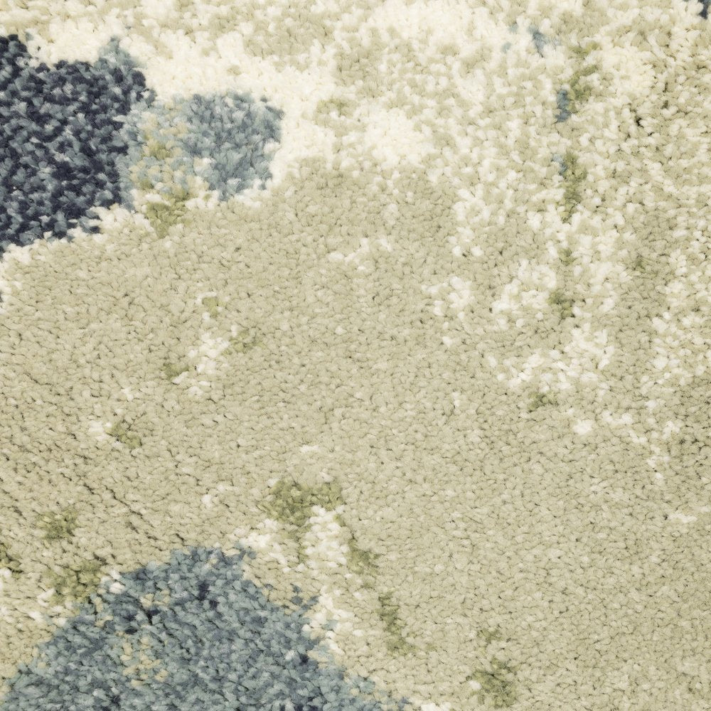 10' X 13' Blue Green And Ivory Abstract Area Rug