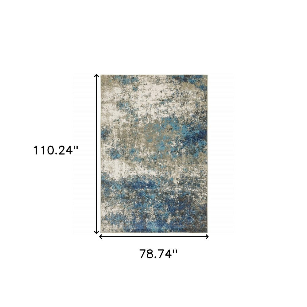 7' X 9' Blue And Beige Abstract Area Rug