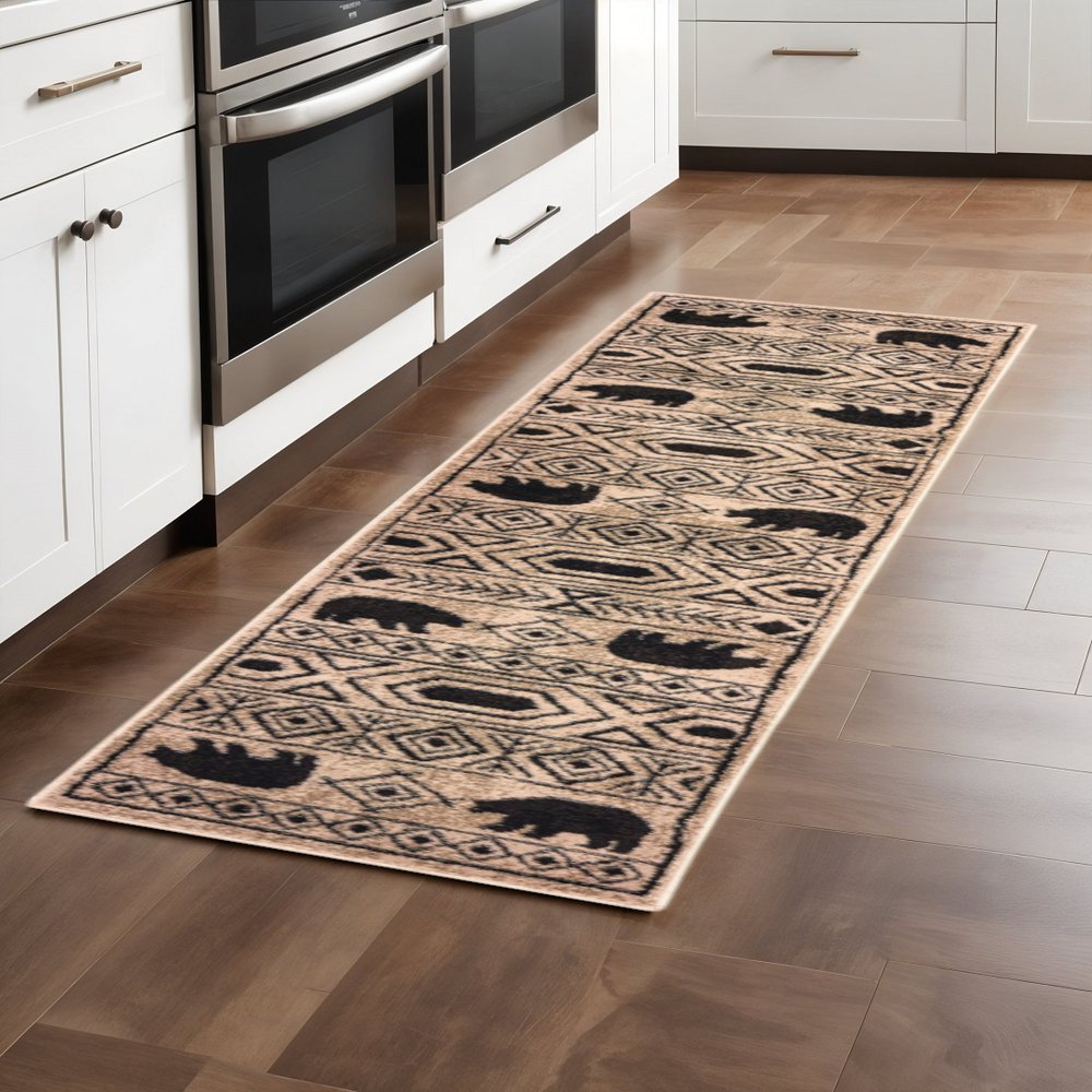 2' X 8' Ivory And Black Southwestern Power Loom Stain Resistant Runner Rug