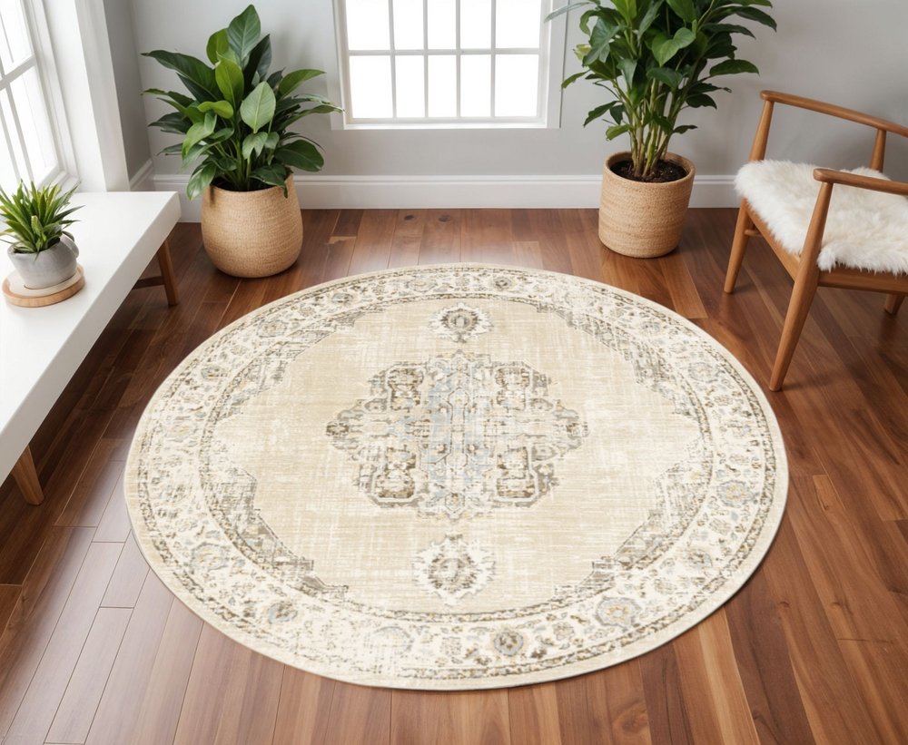 8' Beige and Ivory Round Oriental Power Loom Area Rug