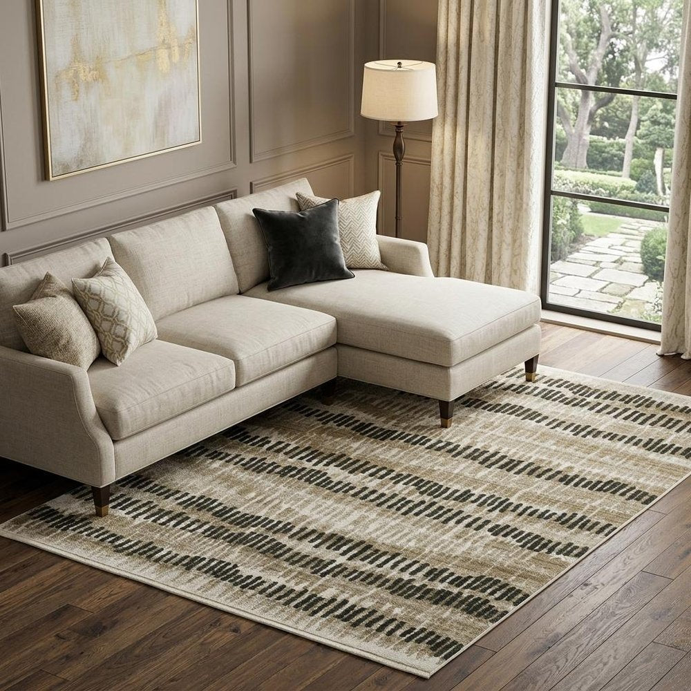 8' X 11' Beige Ivory Charcoal Brown Tan And Grey Abstract Power Loom Stain Resistant Area Rug With Fringe