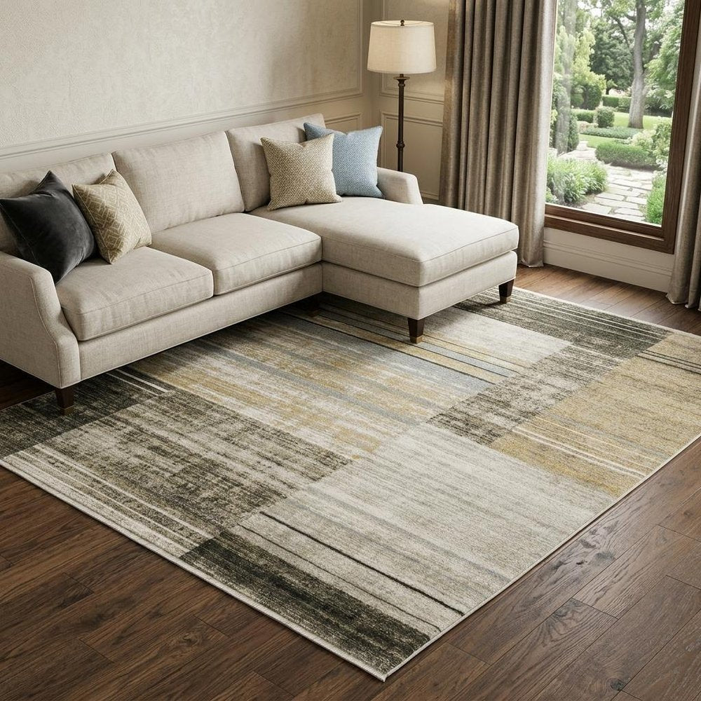 8' X 11' Beige Charcoal Brown Grey Tan Gold And Blue Geometric Power Loom Stain Resistant Area Rug With Fringe