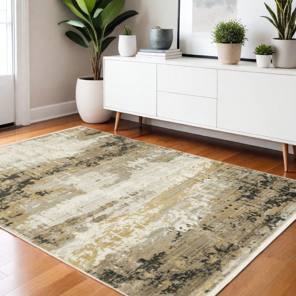 4' X 6' Gray and Black Abstract Power Loom Area Rug With Fringe