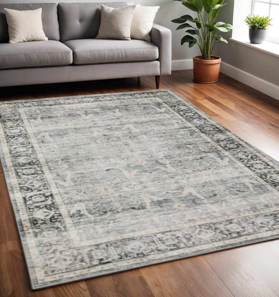 5' X 7' Charcoal Grey Salmon And Ivory Oriental Printed Stain Resistant Non Skid Area Rug