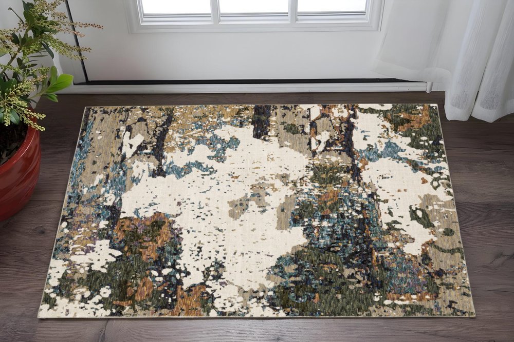 2' X 3' Blue and Ivory Abstract Power Loom Area Rug