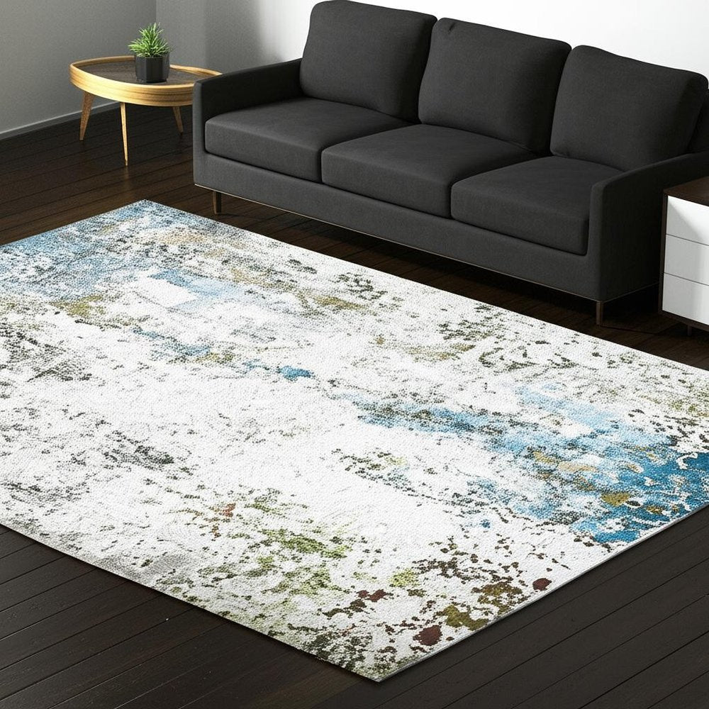 5' X 7' Ivory Teal Blue Grey Brown And Gold Abstract Printed Stain Resistant Non Skid Area Rug