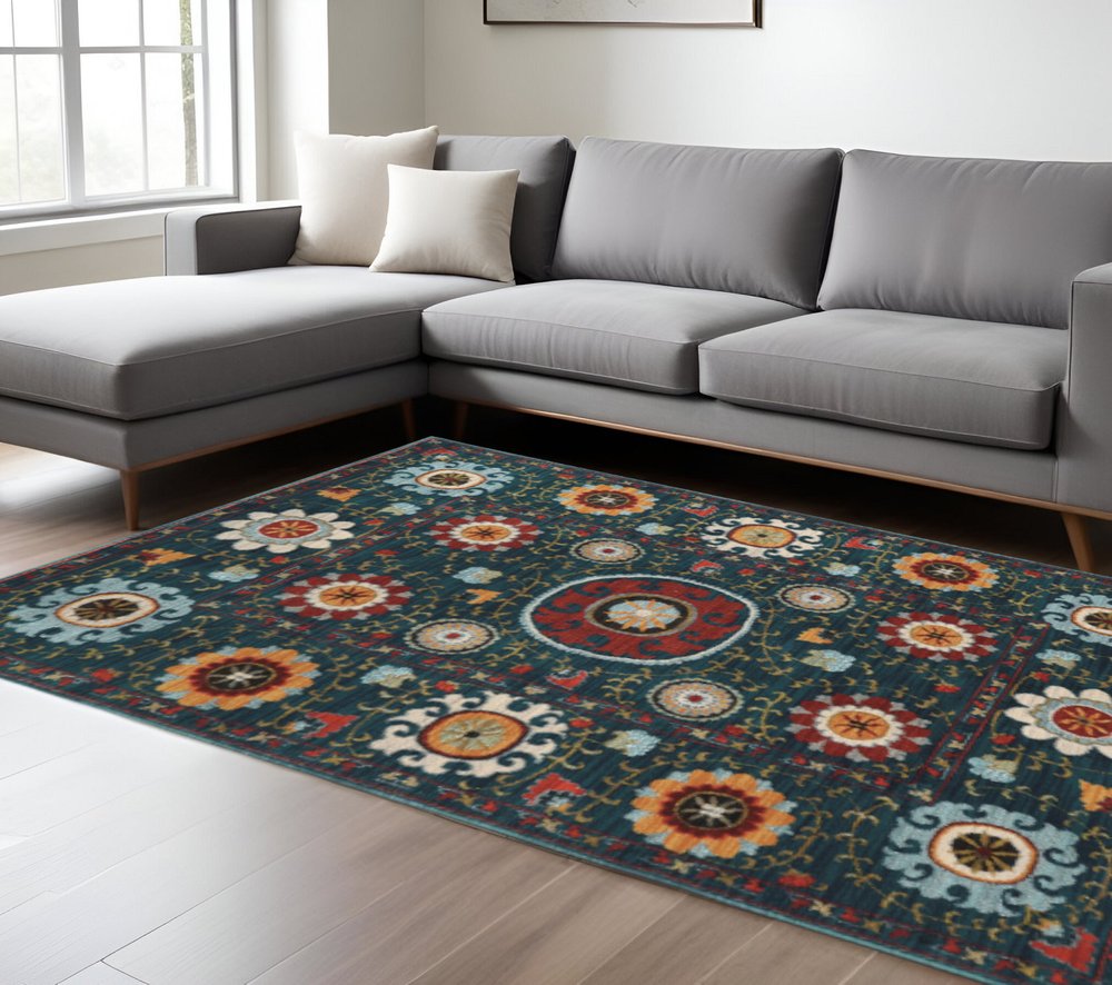 10' X 13' Teal Blue Rust Gold And Ivory Floral Power Loom Stain Resistant Area Rug