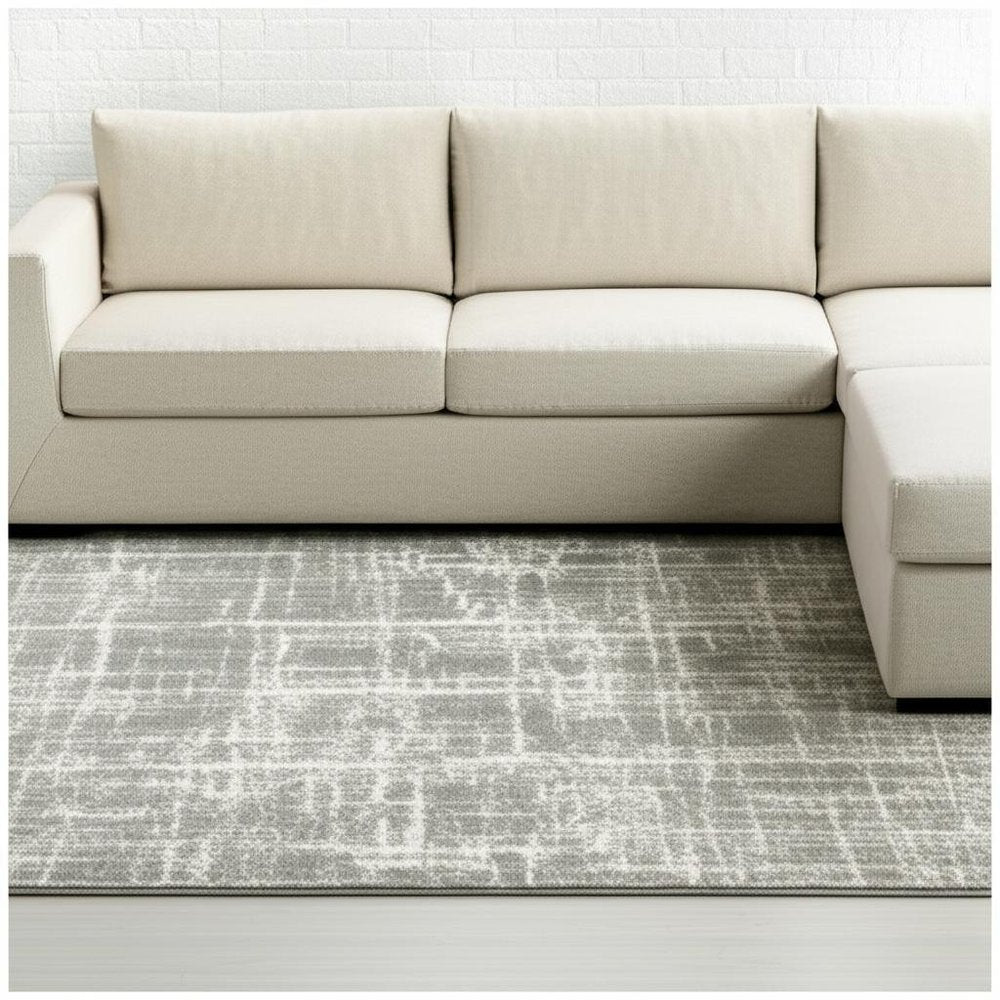 10' X 13' Grey And Ivory Abstract Shag Power Loom Stain Resistant Area Rug