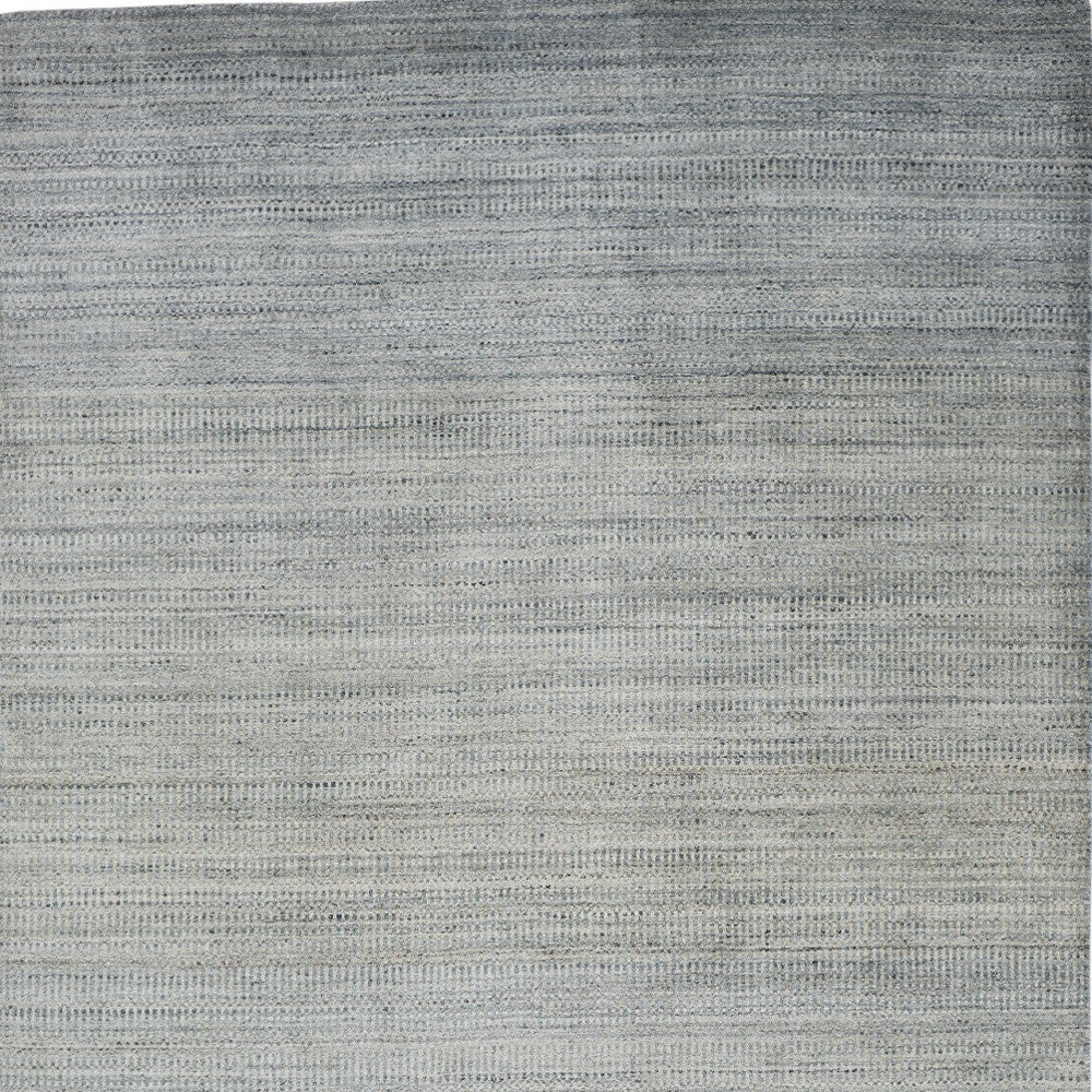 5' X 8' Gray and Ivory Abstract Area Rug