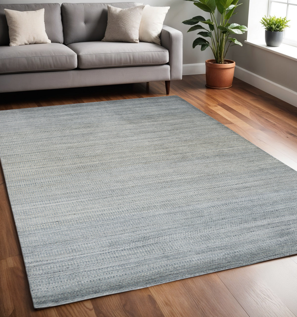 5' X 8' Gray and Ivory Abstract Area Rug