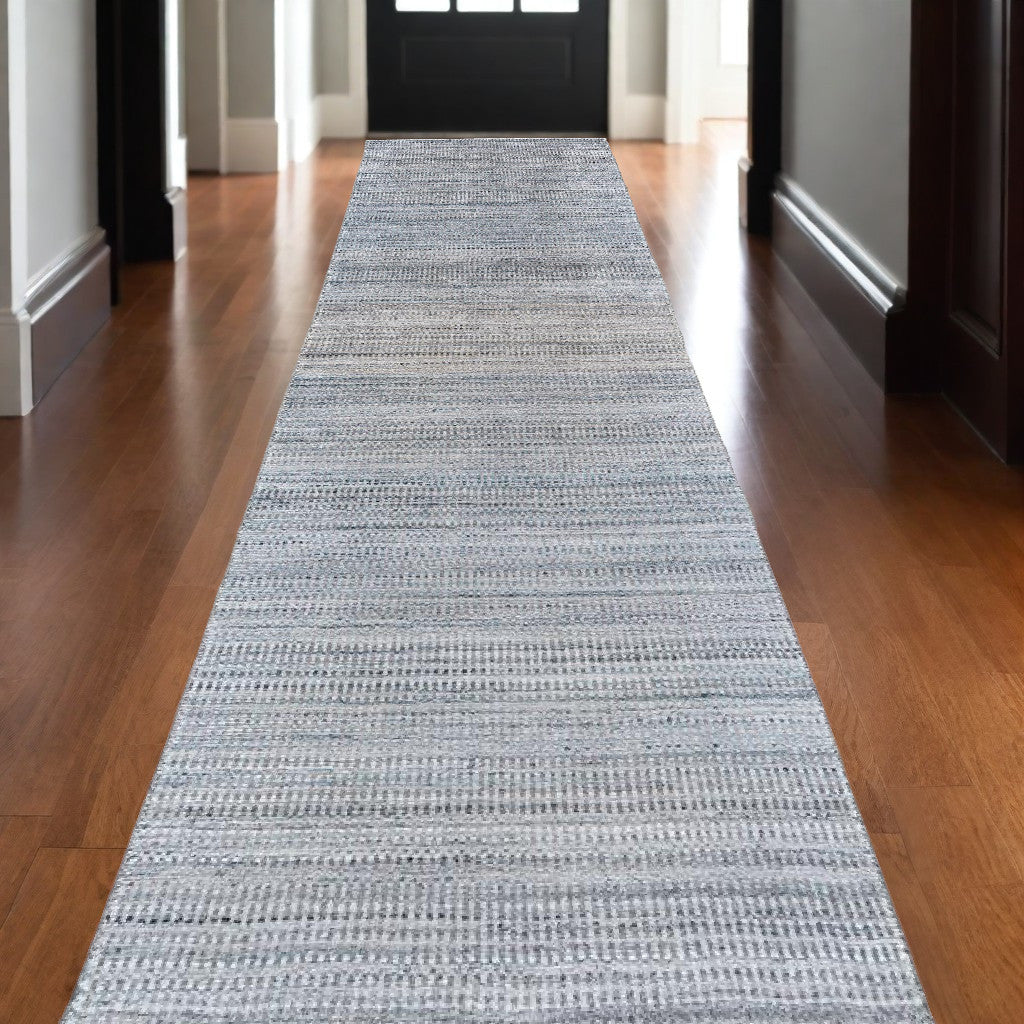 5' X 8' Gray and Ivory Abstract Area Rug