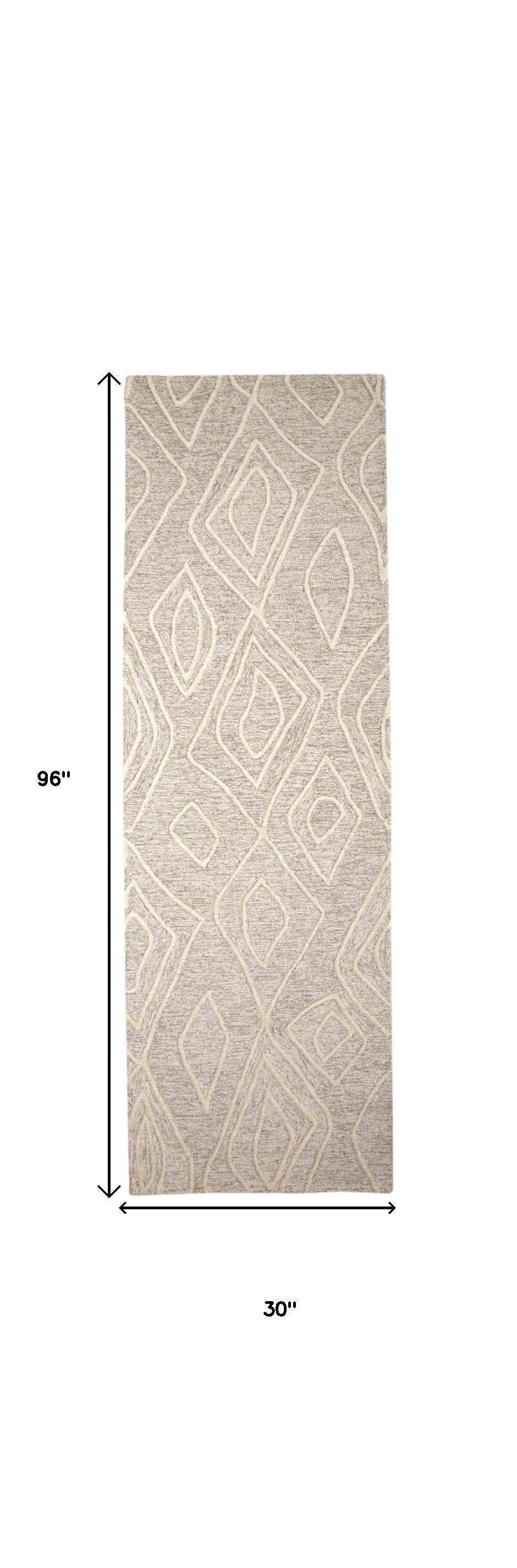 4' X 6' Tan And Ivory Wool Geometric Tufted Handmade Stain Resistant Area Rug
