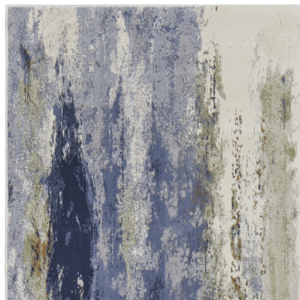 8' X 10' Blue Orange And Ivory Abstract Power Loom Area Rug