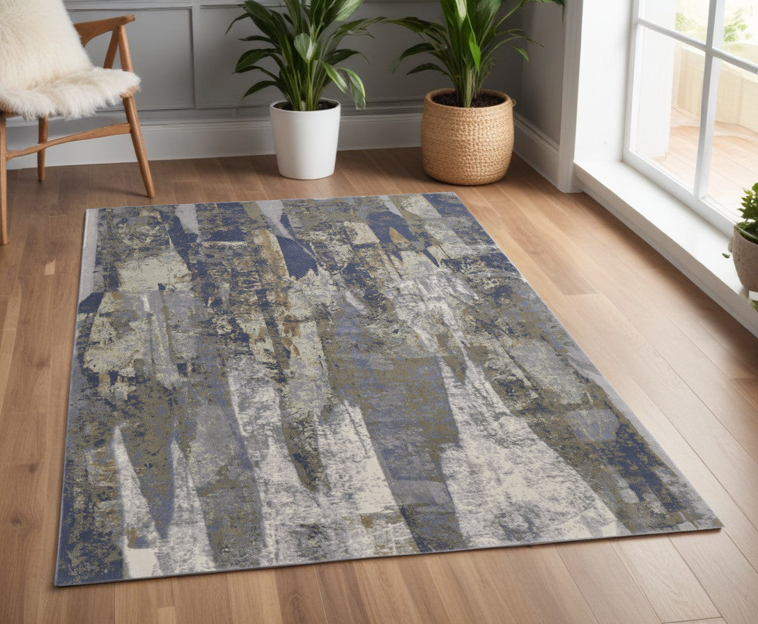 5' X 8' Blue and Ivory Abstract Power Loom Distressed Area Rug