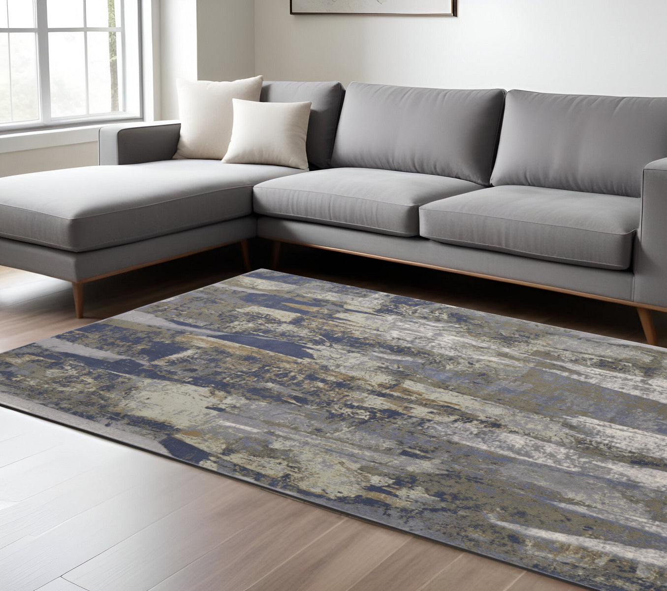 5' X 8' Blue and Ivory Abstract Power Loom Distressed Area Rug