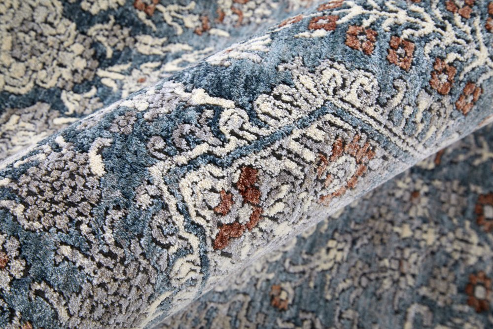 10' X 13' Blue And Ivory Floral Power Loom Stain Resistant Area Rug
