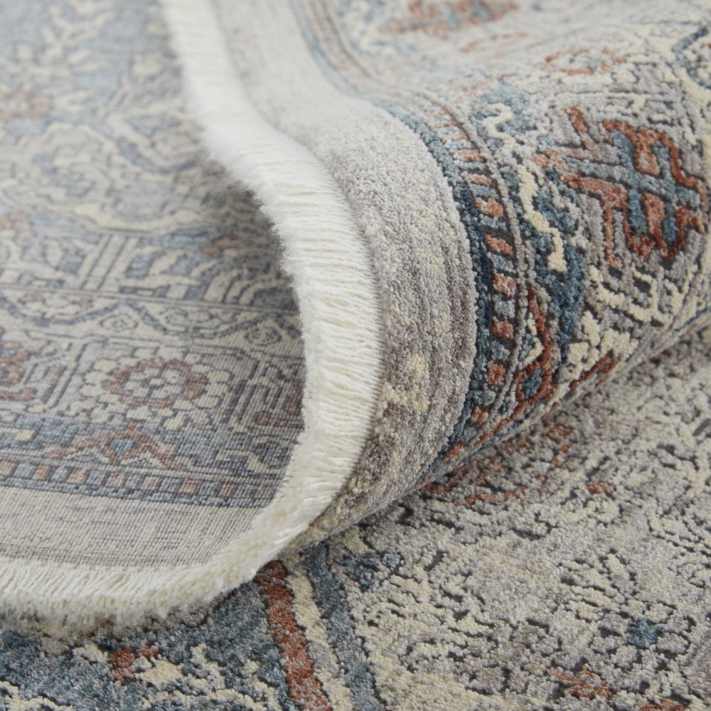 10' X 13' Blue And Ivory Floral Power Loom Stain Resistant Area Rug