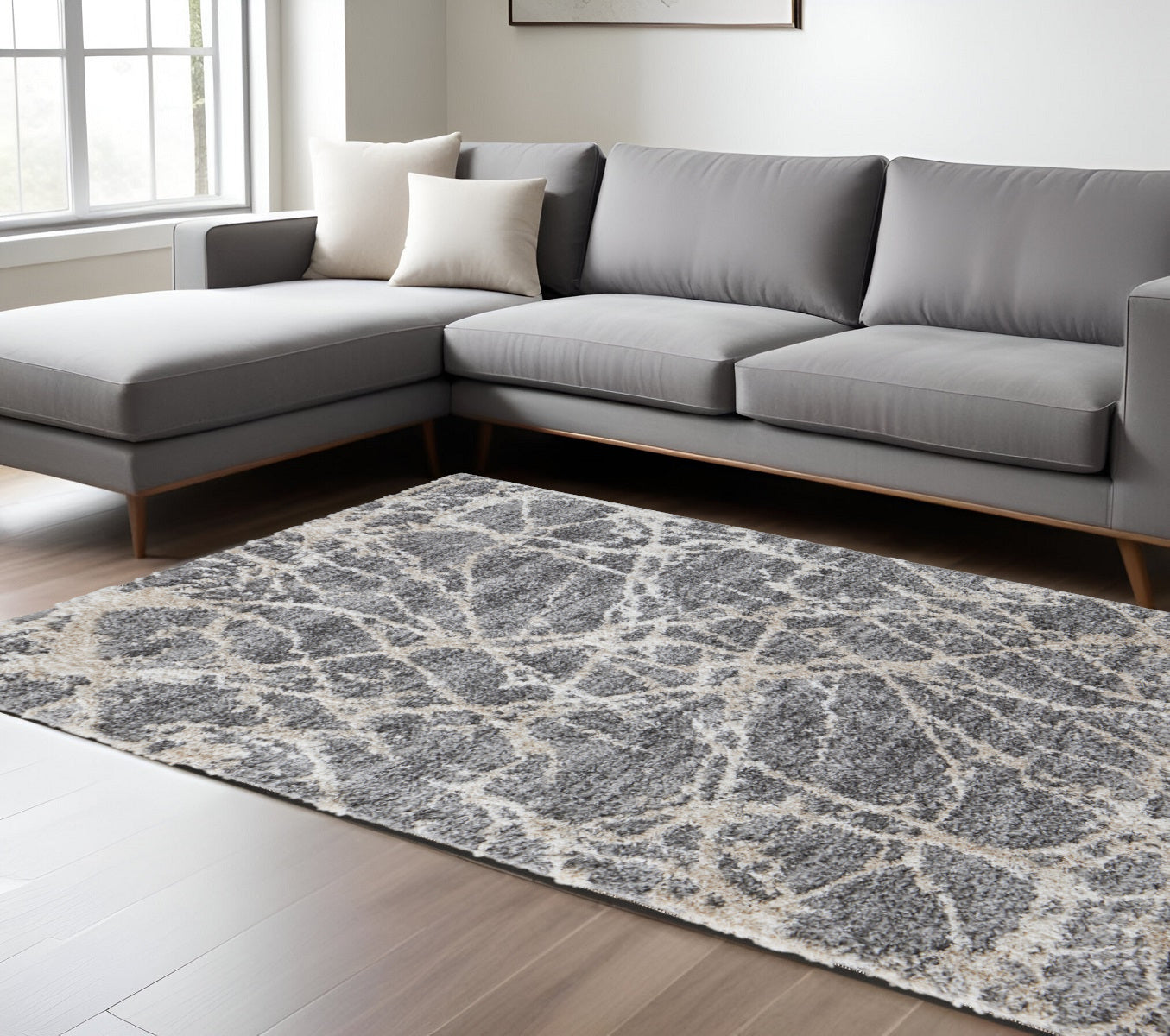 4' X 6' Gray And Ivory Abstract Power Loom Stain Resistant Area Rug