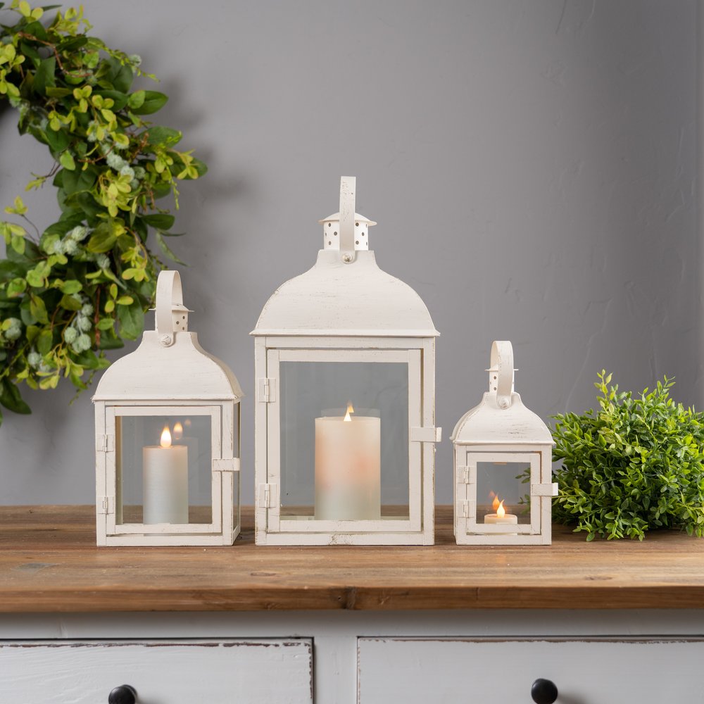 Set of Three Ivory Distressed Glass And Metal Floor Lantern Candle Holders