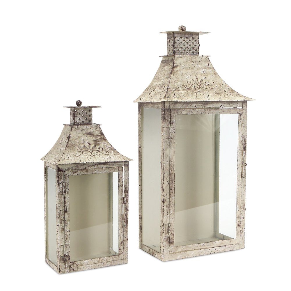 Set of Two Beige Distressed Filigree Iron And Glass Floor Lantern Candle Holders