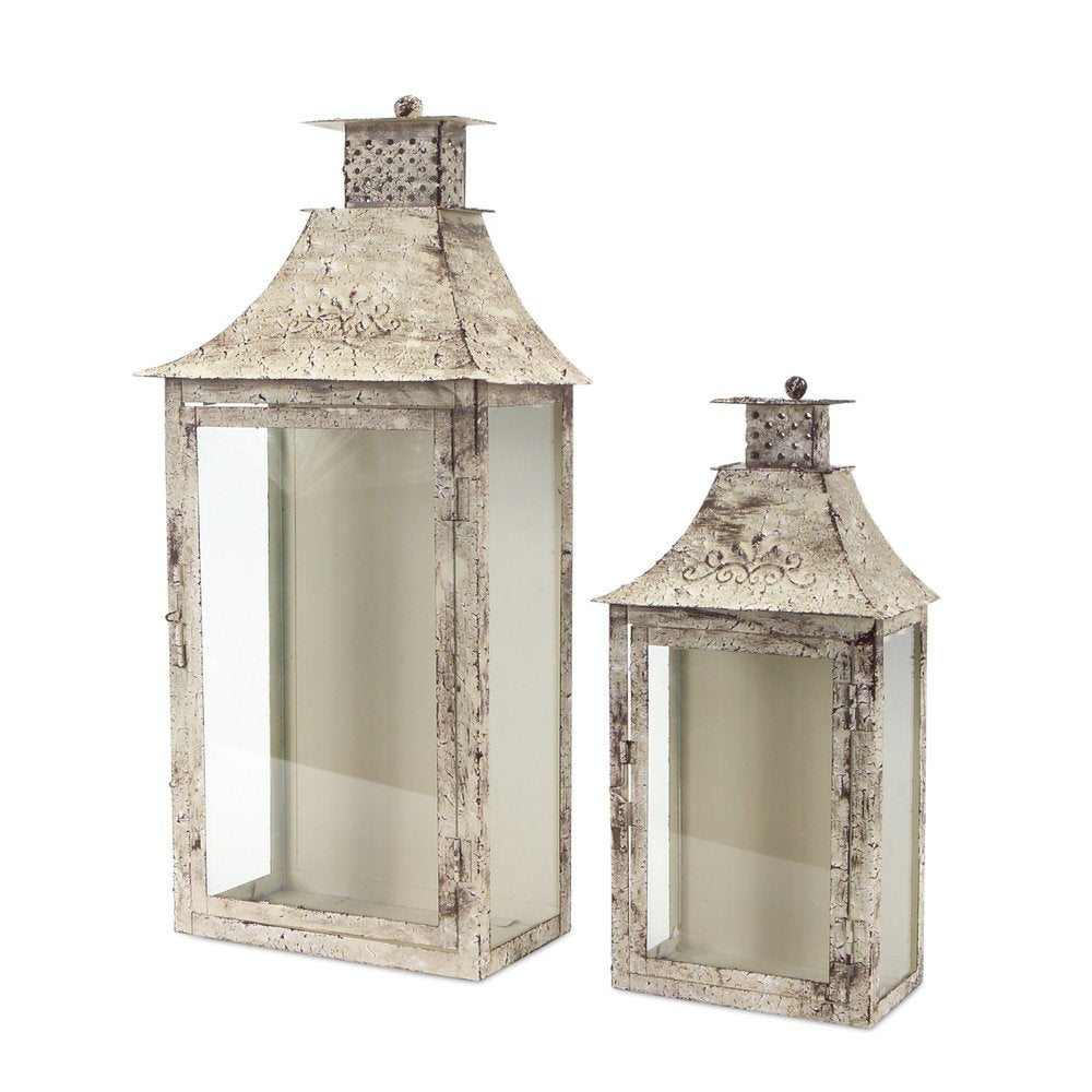 Set of Two Beige Distressed Filigree Iron And Glass Floor Lantern Candle Holders