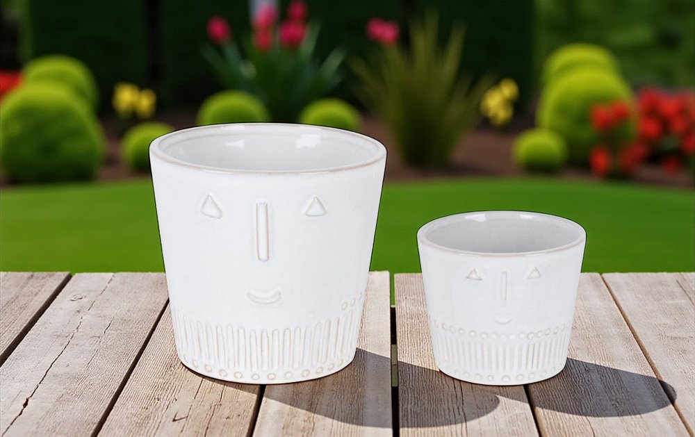 Set of Two White Porcelain 4 Ounce Abstract Face Pot Planters