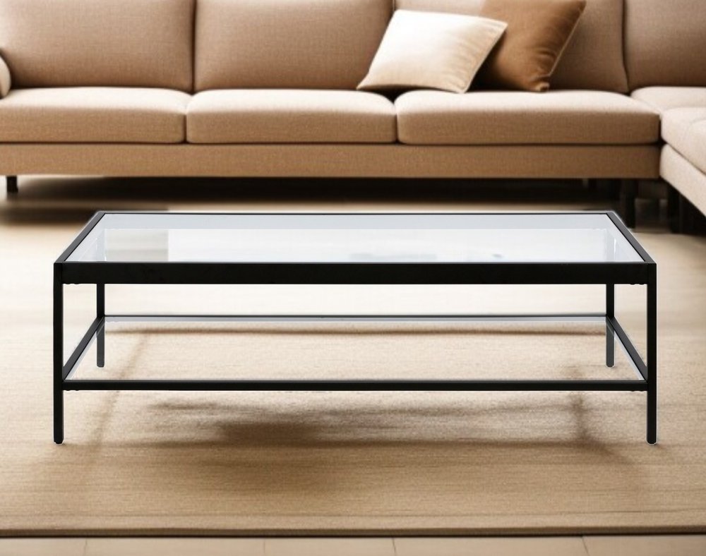 54" Clear And Black Glass And Steel Coffee Table With Shelf