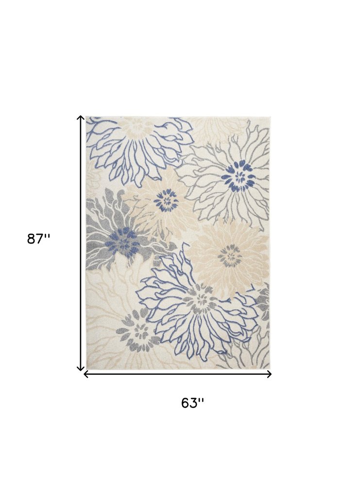 5' X 7' Cream Floral Power Loom Distressed Area Rug